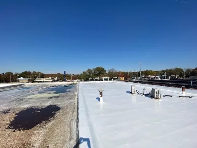 Roofing crew working on residential property